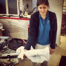 After a plaster cast is made for a client, a plastic sheet is vacuum formed for an exact fit. Because plastics are now used, a heat gun can make tiny adjustments when needed. Yes, that's a bag. No, that's not what Clare usually uses.