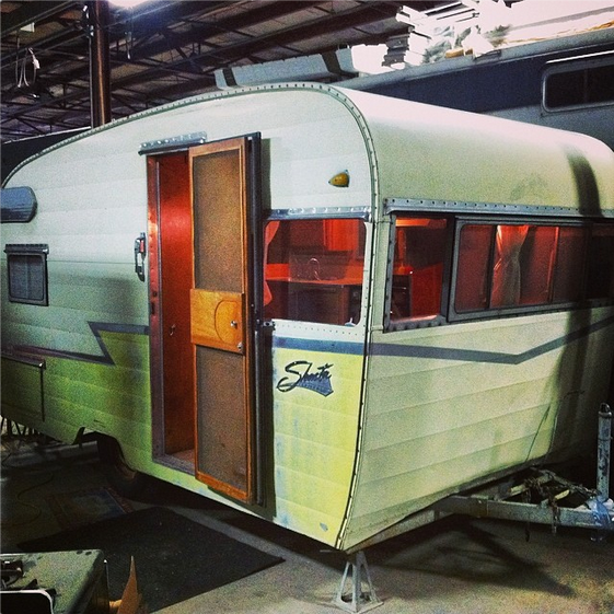 Christie's beloved Shasta, mid-restoration. Shastas were built between 1941 and 2004 and were originally constructed as housing for United States Armed Forces. One of their most charming features are a set of wings on the rear sides of the trailers. These are often difficult to find as they've been stolen off of most of the older models. They are mostly cut off in this pic, but you can see them in the picture above and on the Vin Tin Tin Facebook page.