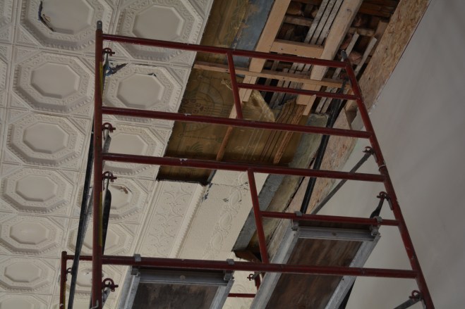In case you were curious, the oldest ceiling layer is actually made of some kind of canvas-like fabric. Yes, fascinating. They aren't going to be able to restore it to that layer, but are keeping some of it as an artifact. We got up onto the scaffolding and geeked out on this one.